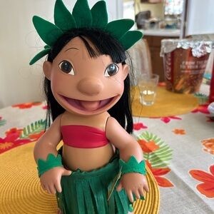 Disney Green and Red Doll with Whimsical Design